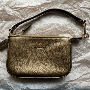 Like new cute Coach metallic  small Wristlet 6” W x 4”H x 1.5” D